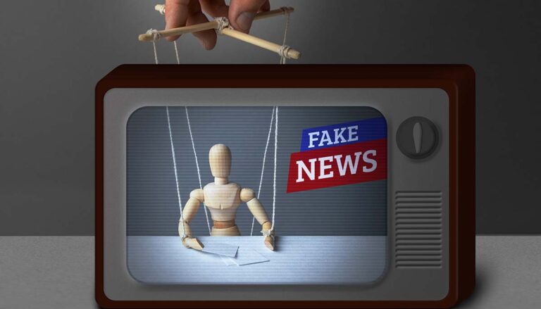 Fake news concept, marionette inside a television
