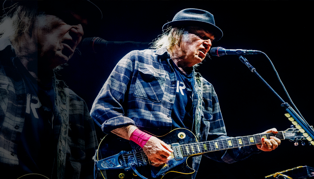 Neil Young playing guitar