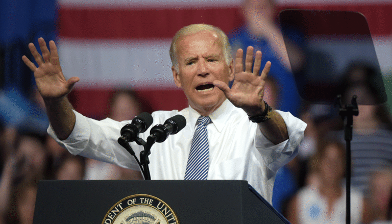 President-Biden-holding-up-hands-and-giving-speech