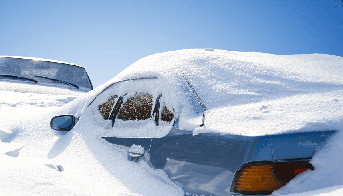 car-stuck-in-snow-drifts