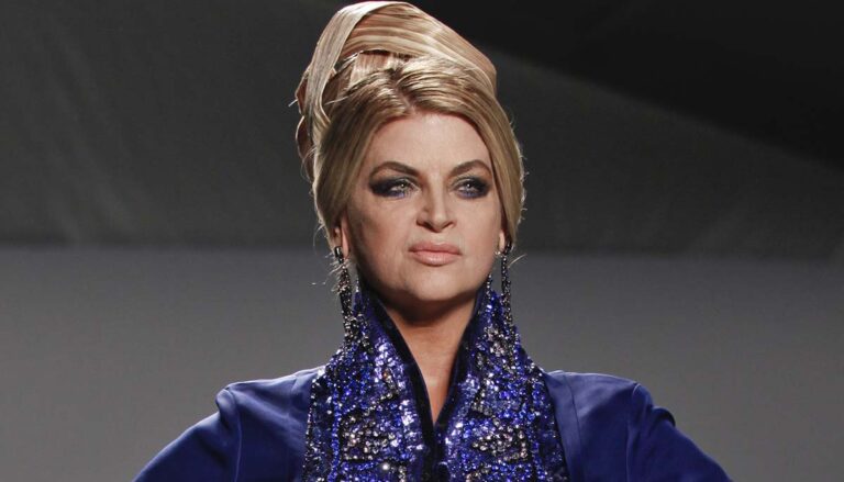 NEW YORK - SEPTEMBER 13: Kirstie Alley walks runway collection by Zang Toi at Mercedes-Benz Spring/Summer 2012 Fashion Week on September 13, 2011 in New York City