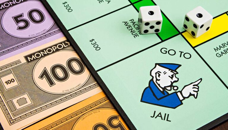 BOISE, IDAHO - NOVEMBER 18, 2012: The monopoly board game was first published by Parker Brothers, currently owned by Hasbro, in 1935