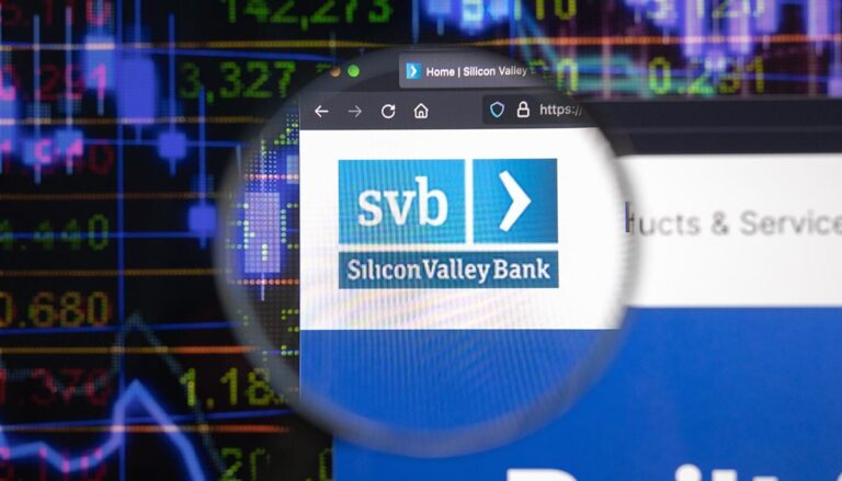 KAUFBEUREN, Silicon Valley Bank svb company logo on a website, seen on a computer screen through a magnifying glass.