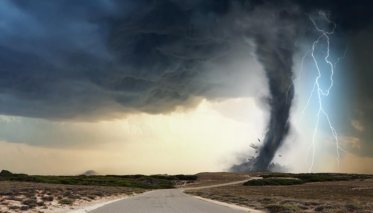 tornado over a desert road